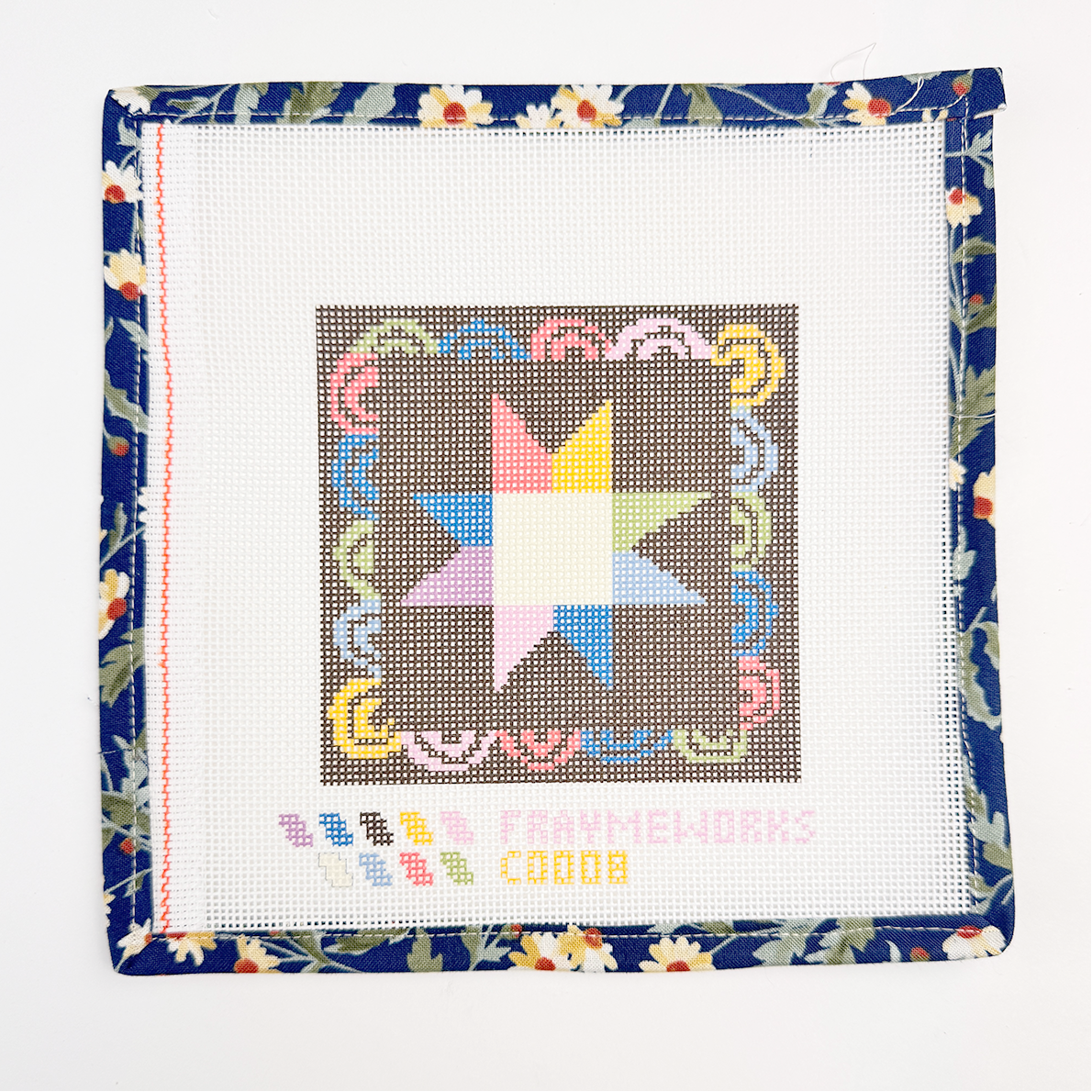 Needlepoint canvas star design on fabric with floral border and Handker design Matilda.